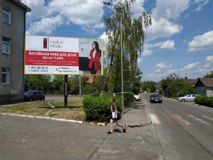 Билборд B в Жовкве, 6x3м.  м. Жовква, вул. Львівська, 15, поряд поліклініка, школа мистецтв, пішохідний перехід, весь рух траспорту на автостанцію, базар, чудова видимість фото 1