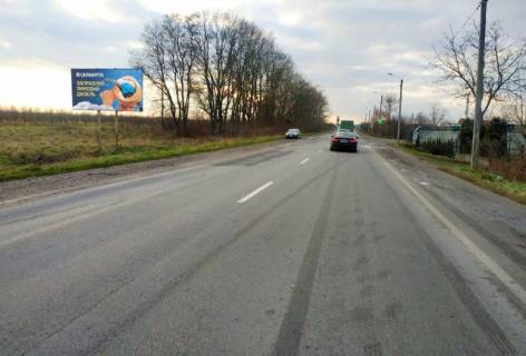 Білборд, Бігборд (Борд)  B у Городку, 6x3м.  м. Городок, вул. Львівська, центральний вїзд всього транспорту в напрямку м. Городок, далі АЗС БРСМ, Lux Wasch, OKKO, до відгалуження на обїздну, в межах населеного пункту, висока конструкція Фото 1