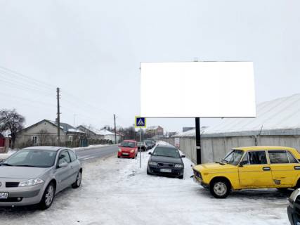 Билборд A в Бродах, 6x3м.  м. Броди, вул. Шептицького, промзона, п-тво "Мода України", склади, СТО, на центр фото 1