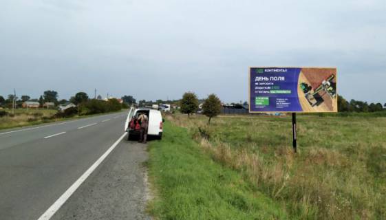 Billboard A in Zhovtansi, 6x3м.  smt.  Zovtanci, vizd v Zovtanci z napramku m. L'vova, na m. Kam'anka - Buz'ka, trasa L'viv-Luc'k (N-17) na m.Radehiv, m. Dobrotvir, m. Gorohiv, m. Luc'k + AZK Motto + avtomijka Lux Wash + zovta vitrozahisna luminescentna ramka Photo 1