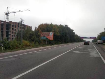 Білборд, Бігборд (Борд)  B у Львові, 6x3м.  вїзд в м. Львів з сторони кордону (м.Рава-Руська), траса Львів- Рава-Руська (М-09) + на АЗК WOG, на автомийку, жовта вітрозахисна люмінесцентна рамка Фото 1