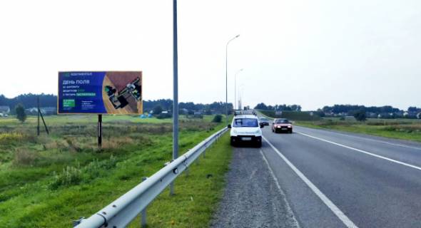 Билборд B в Бродах, 6x3м.  м. Броди виїзд в сторону м. Львів, траса Львів - Київ (Е-40) + жовта вітрозахисна люмінесцентна рамка, + АТБ + АЗК ОККО фото 1