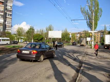 Билборд A в Запорожье, 3x6  062_Парамонова д 10 / ул Закарпатського Легіону (Комарова) (по догоге на космос) фото 1