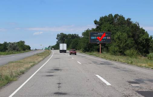 Билборд A на трассах Днепровской области, 3x6  траса Петриківка - Лобойківка, напрям до м. Кам'янське, перед АЗС WOG фото 1