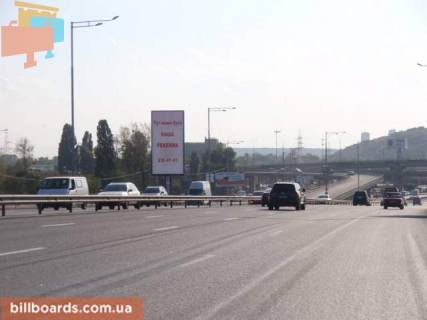Бэклайт  в Киеве Наддніпрянське шосе виїзд з вул. Промислової, (на зеленій зоні). фото 1