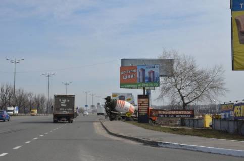 Білборд, Бігборд (Борд)  A у Києві, 3x6  Окружна, перед Жулянським мостом Фото 1