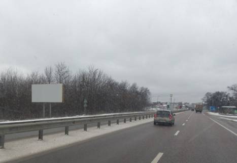 Білборд, Бігборд (Борд)  B у трасах Житомира, 3х6  в'їзд у місто зі ст. Бердичева, Вінниці, Бердичівське шосе, виїзд із АЗС ОККО, навпроти ВОГ, у напр. повороту на с.Зарічани, будівельного маркету, міні-готель "Шале", АТБ, перед поворотом на об'їзну на Київ Фото 1