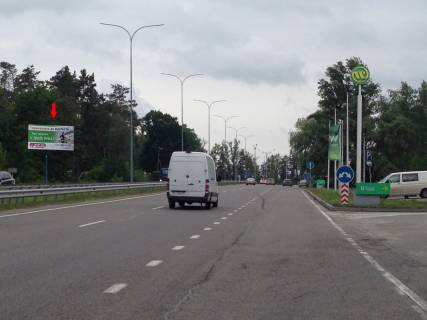 Billboard B in Vishgorod, 3х6  st. Bogatirskaa, Kiev, R-69, 2750 m ot certy goroda (trassa v storonu Mezigor'a, zoopark "12 mesacev" naprotiv zapravki WOG) / vyezd iz Kieva (Obolon') Photo 1