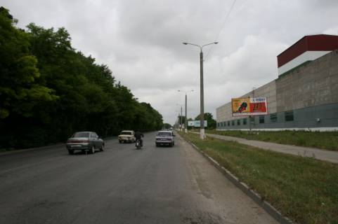 Билборд A в Каменец-Подольском, 3х6  Хмельницьке шосе посеред цеху Модуль фото 1