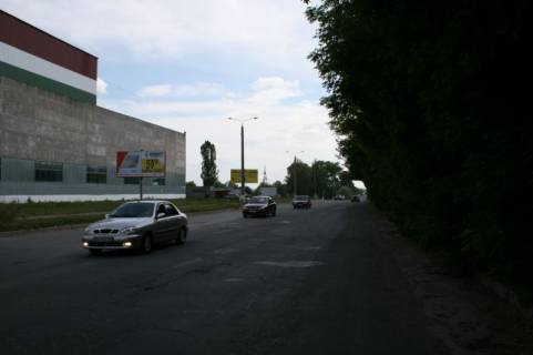 Билборд B в Каменец-Подольском, 3х6  Хмельницьке шосе посеред цеху Модуль фото 1