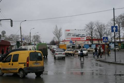 Білборд, Бігборд (Борд)  A у Кам'янець-Подільському, 3х6  перехрестя вул.Кн. Коріатовичів та вул. Першотравнева (в’їзд на автовокзал) Фото 1