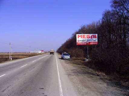 Билборд A на трассах Ивано-Франковской области, 3x6  Траса Н-09 Мукачево-Львів, с.Лісна Тарновиця 5 км. після Надвірної,  напрямок руху на Івано-Франківськ фото 1