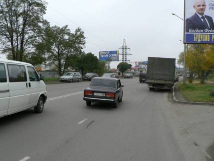 Билборд B в Буковеле Довженка (Мазепи супермаркети Велес, Comfy) АЗС ТНК, авторинок, Льодова Арена, АЗС WOG, напрямок руху від вул.Коновальця (АЗС ОККО, супермаркет ВелМарт)  в напрямку Мазепи (Набережна) фото 1