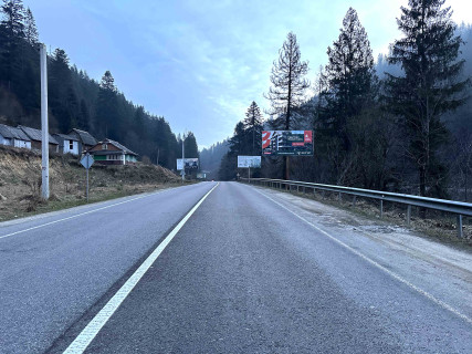 Билборд A в Микуличине, 3x6  Траса Н-09 Мукачево-Львів, 300 м після готелю Гост (Гердан), піцерія РоТате, в`їзд у селище, напрямок руху на Буковель (другий) фото 1