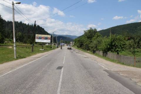 Билборд B в Микуличине, 3x6  Траса Н-09 Мукачево-Львів, 250 м перед готелем Гердан, виїзд з селища, напрямок руху на Івано-Франківськ фото 1