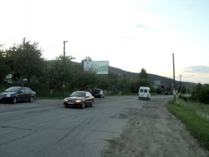 Билборд B в Яремче, 3x6  Траса Н-09 Мукачево-Львів, виїзд з міста в сторону Івано-Фр, після кам`яним знаком Яремче, напрямок руху на Івано-Франківськ фото 1
