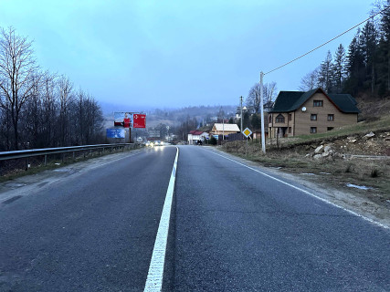 Билборд B в Микуличине, 3x6  Траса Н-09 Мукачево-Львів, 300 м перед готелем Гердан, піцерія РоТате, виїзд з селища, напрямок руху на Івано-Франківськ фото 1