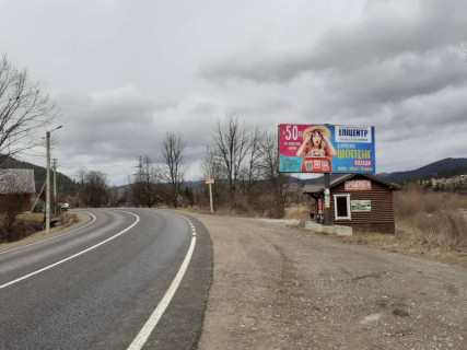 Билборд A в Микуличине, 3x6  Траса Н-09 Мукачево-Львів, центр селища, готельний комплекс ГудзонХаус, санаторій Смерічка, напрямок руху на Івано-Франківськ фото 1