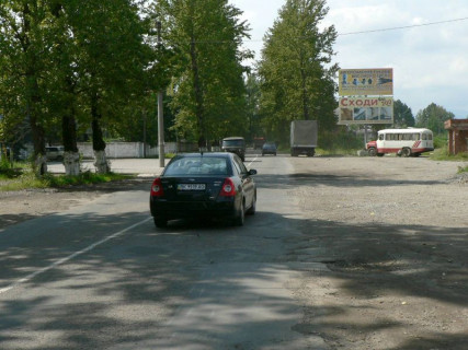 Билборд A в Надворной, 3x6  Траса Н-09 Мукачево-Львів, вул.Січинського, шиномонтаж, Лісбуд, будевільний серепмаркет, напрямок руху на Яремче, Буковель фото 1