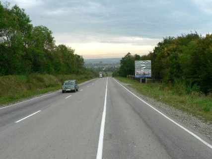 Билборд A в Надворной, 3x6  Траса Івано-Франківськ-Богородчани-Надвірна, на в`їзді у Надвірну з Богородчан, напрямок руху на Надвірну, Яремче, Буковель (низ) фото 1