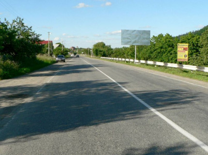 Билборд A в Яремче, 3x6  Траса Н-09 Мукачево-Львів, виїзд з міста в сторону Івано-Фр, біля кам`яного знаку Яремче,  напрямок руху на Івано-Франківськ фото 1