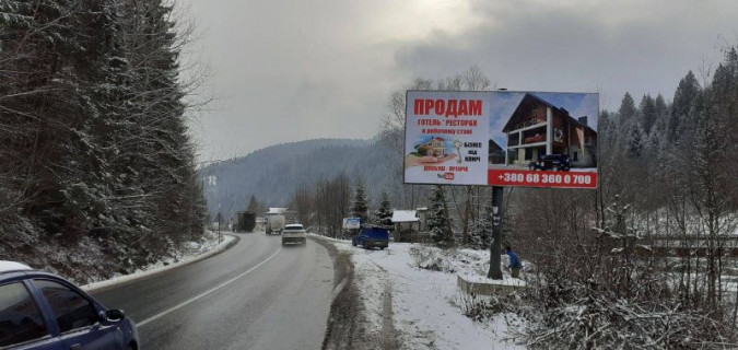 Билборд A в Микуличине, 3x6  Траса Н-09 Мукачево-Львів, в`їзд у селище, готельны комплекси Срыбны Роси, Микулин Хутырець, напрямок руху на Буковель фото 1