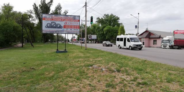 Билборд B в Кривом Роге перехрестя 129-ї бригад.територ.оборони вул. (кол. Купріна)  та вул. Окружна.  Змичка. Напрямок руху на виїзд з міста фото 1