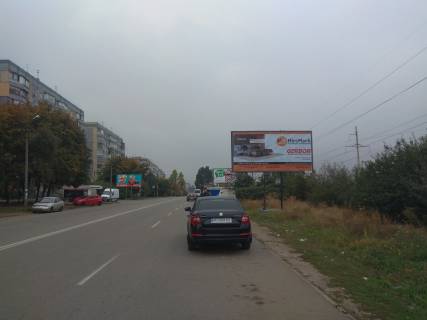 Билборд A в Кривом Роге вул. Лісового, 12. Східний-2. напрямок руху до Східний-1 та Вечірній. Зупинка міського транспорту. Станція  ШТ 2-га міська лікарня фото 1