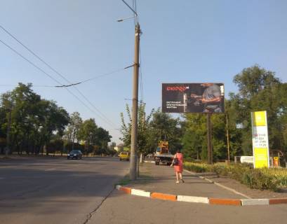 Білборд, Бігборд (Борд)  A у Кривому Розі пр. Металургів, 2а, заправка "Sun Oil" напрямок руху від Арселору до пр. Металургів Фото 1