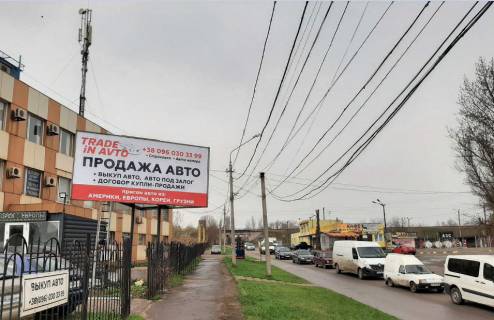 Билборд B в Кривом Роге перехрестя вул. Дарвіна  та вул. Волгоградської 11А. Напрямок руху від Волгоградської до вул. Гетьманської фото 1