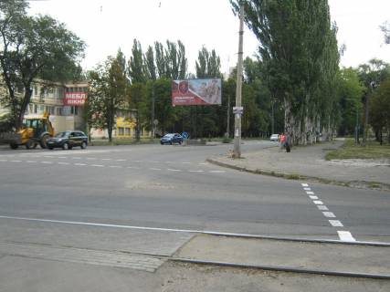 Билборд A в Кривом Роге  вул Каховська - вул. Тбіліська. Розділювач в напрямку руху від ПівдГЗК до вул. Пісочної. Трампарк, ДонНУЕТ, велика транспортна розвязка, ринок Трампарк. фото 1