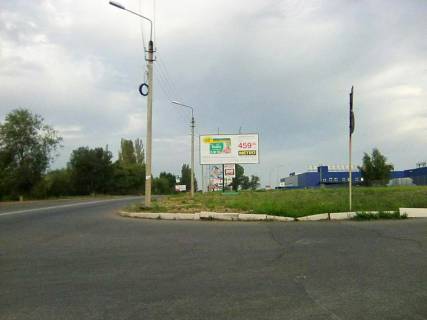 Билборд A в Кривом Роге Леоніда Бикова вул. (кол. Лепешинської), 31. ТЦ "МЕТРО", ТЦ Епіцентр, АЗС Сентоза и РЛС. Напрямок від Східний -1 до Епіцентру та пл.Поля. Великий трафік транспорту. фото 1
