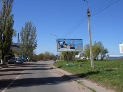 Билборд A в Кривом Роге  Леоніда Бикова вул. (кол. Лепешинської), 31 ТЦ "Метро", Епіцентр, Автобазар, заправки "RLS"та інші, напрямок руху від окружної до пл. А. Поля фото 1