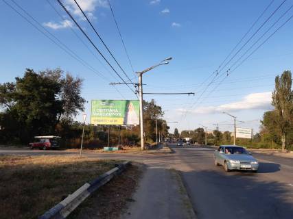 Билборд B в Кривом Роге вул. Днепр.шосе, АЗС, напрямок руху від Автовокзалу дл об’їздної. Розв′язка з об’їздною дорогою з великим трафіком фото 1