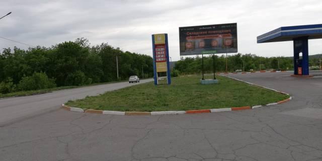 Билборд A в Кривом Роге Миколаївське шосе 145, виїзд, заправка "Sun Oil" фото 1