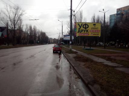 Билборд A в Кривом Роге перехрестя вул. Десантної та вул. Електричної, після повороту на Терру. напрямок руху в сторну об'їздної дороги  фото 1