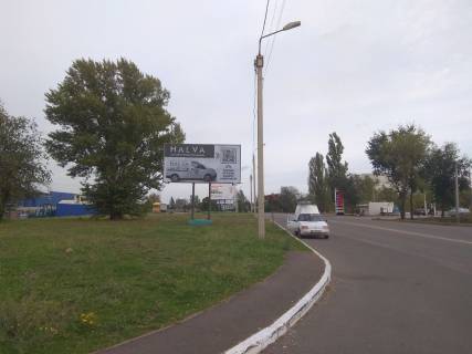 Билборд B в Кривом Роге Леоніда Бикова вул. (кол. Лепешинської), 33, напрямок від пл.Поля, ТЦ Епіцентр, ТЦ Метро, АЗС Сентоза та РСТ, потік транспорту до об′їздної. фото 1