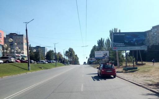 Билборд A в Кривом Роге мкн-н 5-й Зарічний,25 ТРК Терра, маг Варус, велика кількість торг.точок. Напрямок руху до КРЕСу фото 1