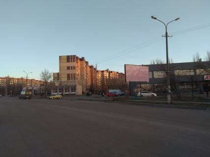 Білборд, Бігборд (Борд)  A у Кривому Розі Павла Глазового вул. (кол. Балакіна), 22, напрямок руху до ТЦ Метро. Микрорайон Вечірній, АТБ, РК Святошин. Великий спальний район. Фото 1