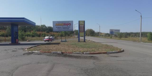 Білборд, Бігборд (Борд)  B у Кривому Розі Миколаївське шосе 145, заїзд до міста, заправка Sun Oil Фото 1