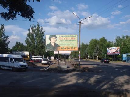 Билборд B в Кривом Роге вул. Горняків, 38 - мкр-н. Інгулець, заїзд до Автовокзалу Інгулець, пицерія "Челентано". фото 1