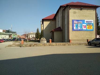 Білборд, Бігборд (Борд)  A у Коломиї вул. Ірини Вільде (фасад приміщення РАЦСу) Фото 1