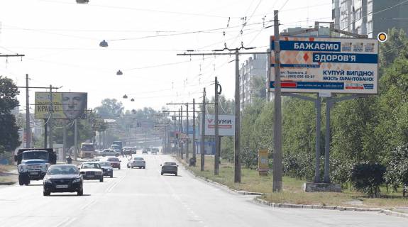 Билборд A в Сумах, Щит 3x6  Героїв Крут вул. (Черепіна) / Івана Сірка вул. (Дем’яна Коротченка), з центру фото 1