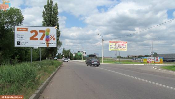 Білборд, Бігборд (Борд)  B у Кривому Розі, Щит 3x6  Бикова вул, навпаки виїзду з Епіцентру Фото 1