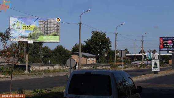 Билборд B в Луцке, Щит 3x6  Карпенка-Карого вул / Сухомлинського вул., СТО ПЕЖО, в центр фото 1