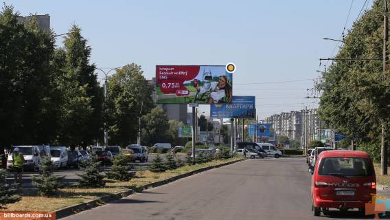 Білборд, Бігборд (Борд)  A у Луцьку, Щит 3x6  Яремчука Назарія (колишня Єршова) вул, ТЦ ГЛОБУС, роздільник, в центр Фото 1