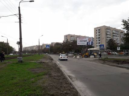 Білборд, Бігборд (Борд)  A у Києві, 6х3  вул. Симиренка, 16а біля дорослої поліклінніки напр. до пр. Відрадний Фото 1