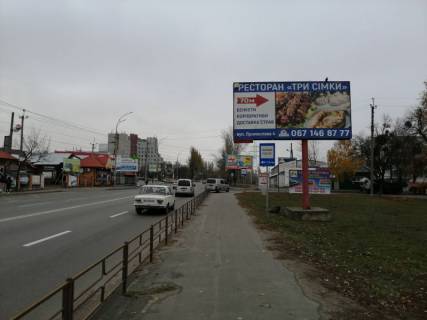 Billboard A in Vishgorod m. Visgorod, st. Naberezna, povorot na st. Promislova, bila zavodu ZBMK, cerez 75m pisla AZS WOG Photo 1