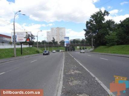 Білборд, Бігборд (Борд)   у Києві Окружная дорога, съезд с просп. Берестейський (Перемоги) на Большую Окружную Фото 1