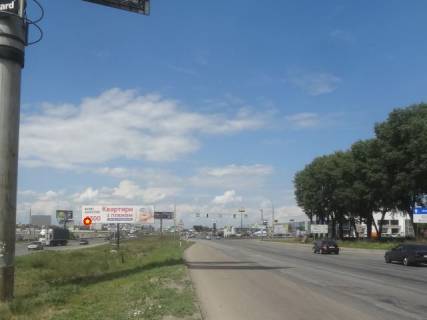 Билборд  в Киеве Б. Окружная 12 перед поворотом на ул. Трублаини левое ухo к Победы фото 1